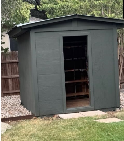 Backyard storage shed still standing before demolition in Austin, TX