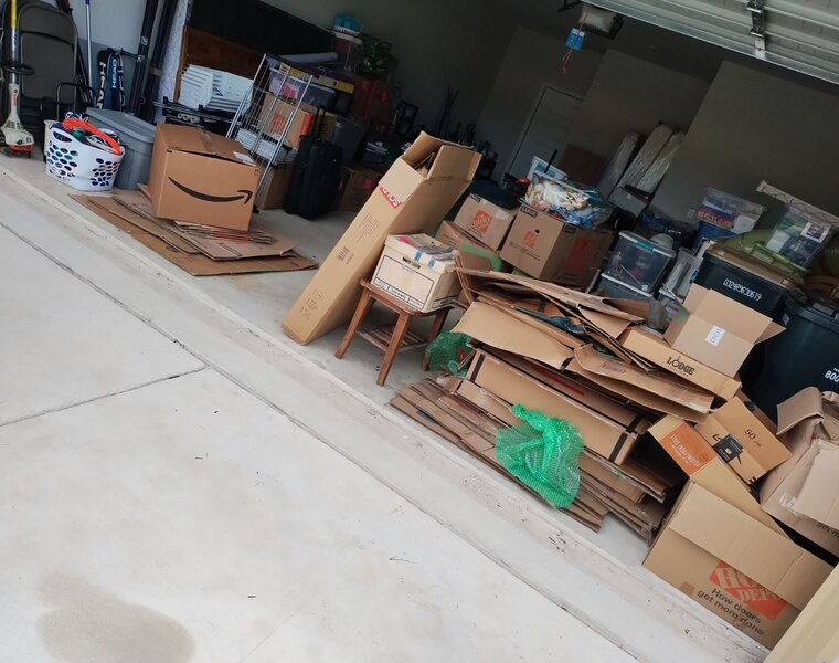 A garage cleanout job in progress by Affordable Junk Removal in Austin, TX